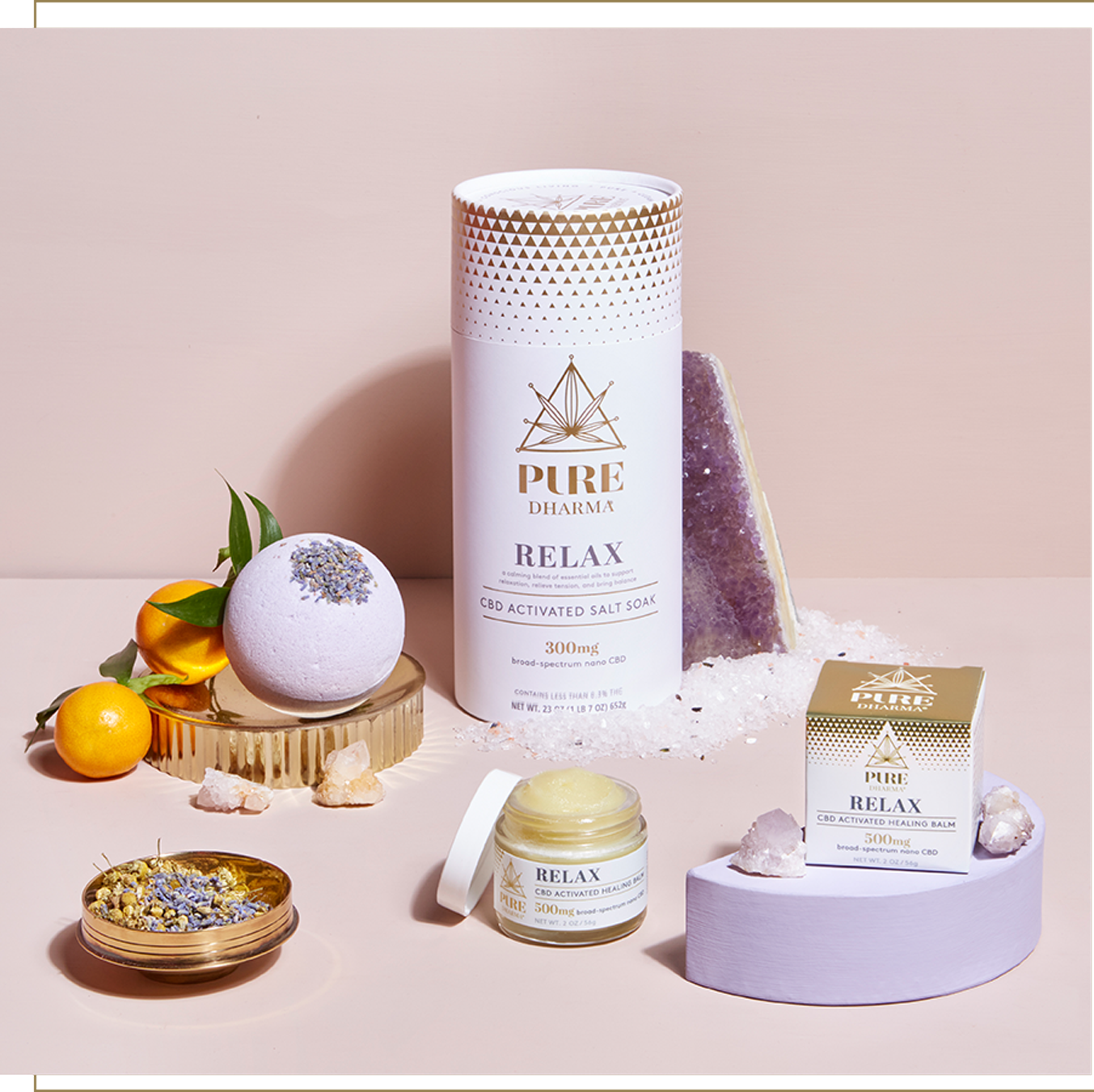 Image Showcasing Pure Dharma Relax Salt Soak, Healing Balm, and Bath Fizz