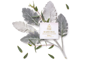 Image of Radiance CBD Activated Face Creme Atop a Botanical