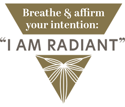 Gold Triangular Image with White Text Saying Breathe & Affirm Your Intention: "I AM RADIANT"